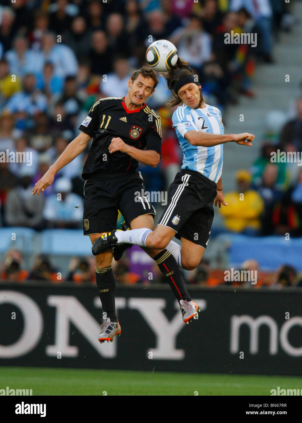 MIROSLAV KLOSE MARTIN DEMICHEL ARGENTINA V GERMANY GREEN POINT STADIUM CAPE TOWN SOUTH AFRICA 03 July 2010 Stock Photo