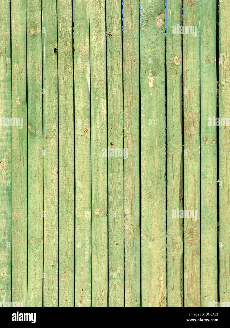 Old green wooden fence close-up, Moscow outskirts, Russia Stock Photo