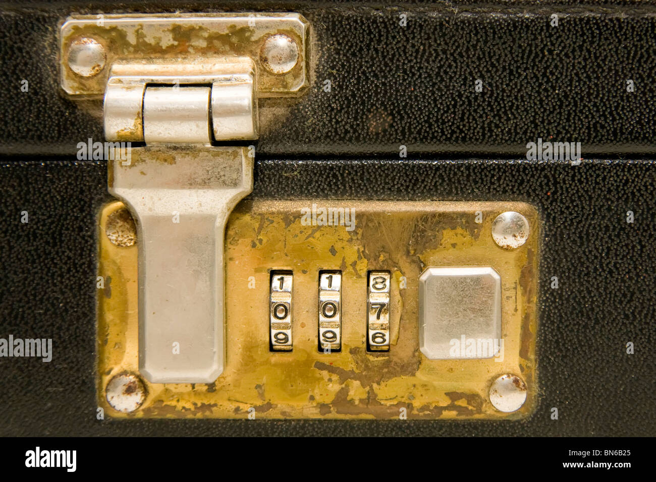 Golden Briefcase lock with the numbers 007 Stock Photo Alamy