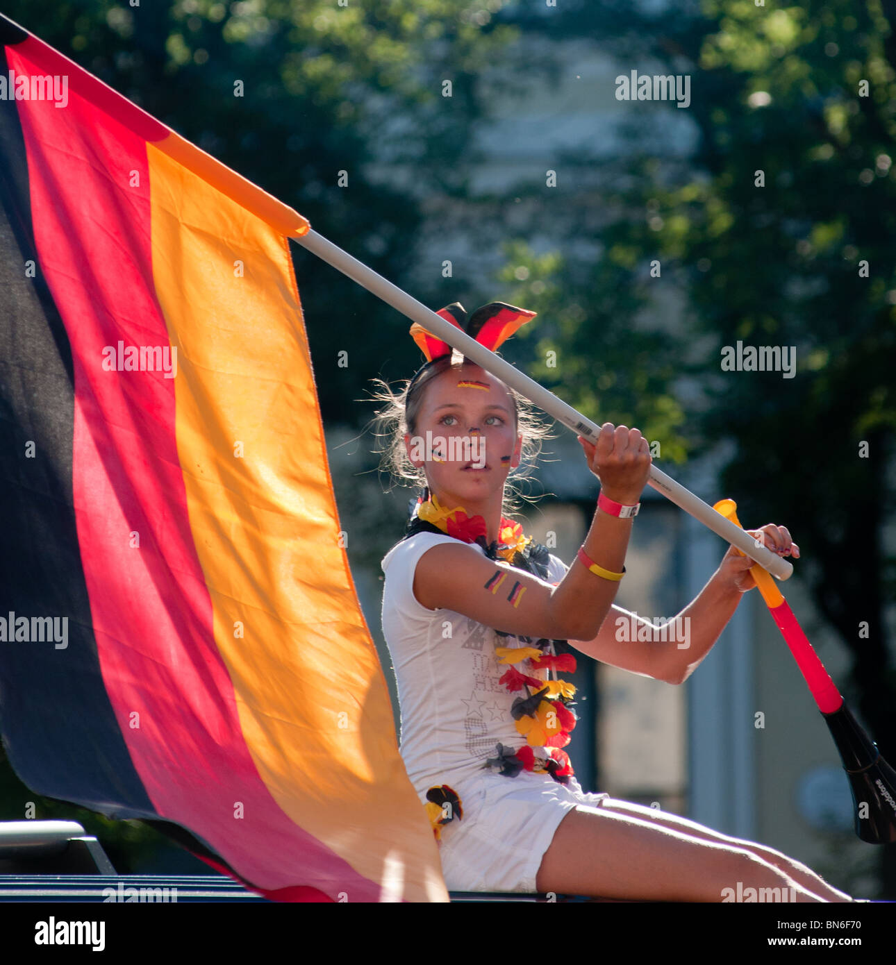 Pretty German girl celebrating a win during the 2010 soccer world cup Stock Photo