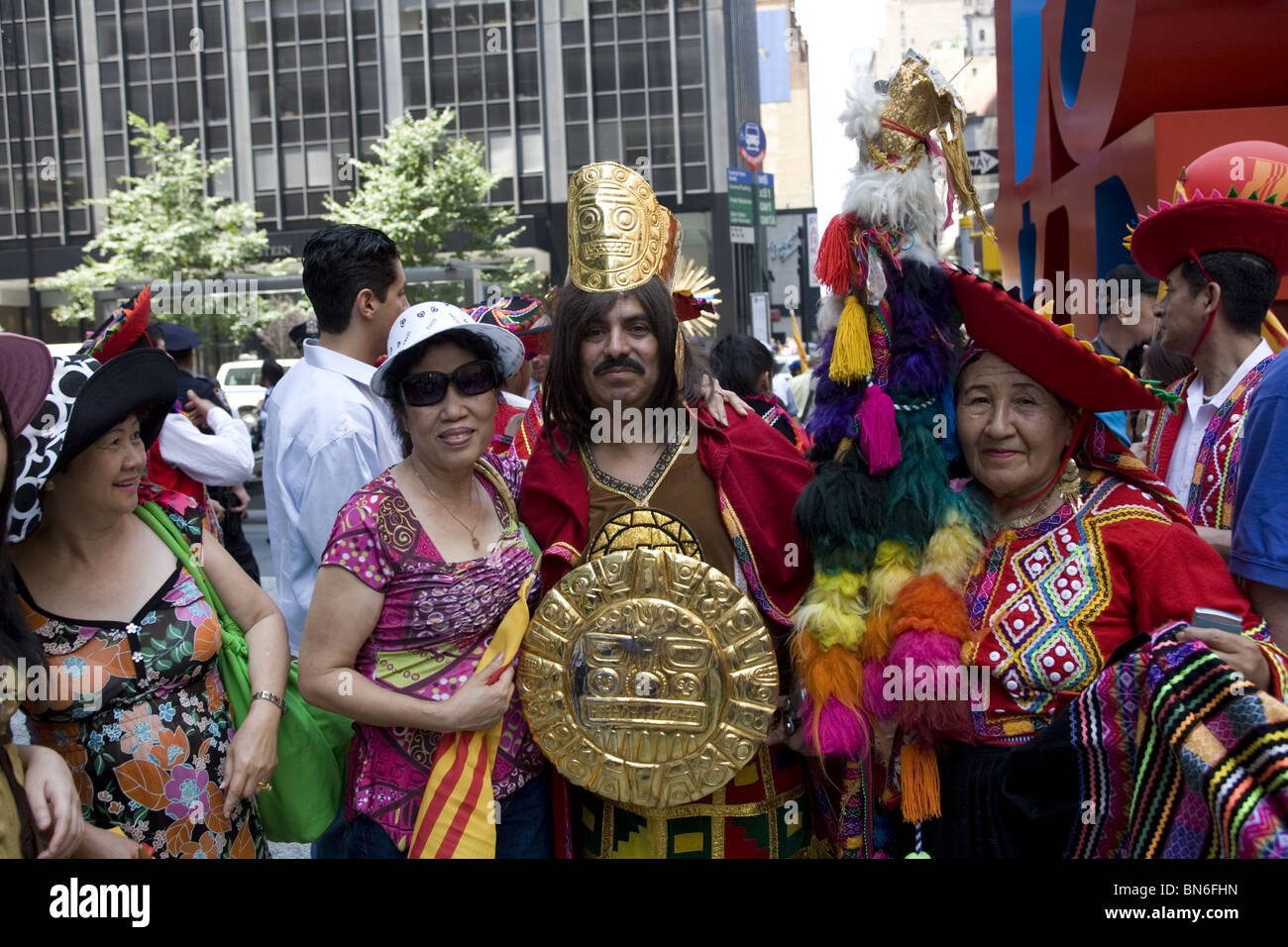 International Immigrants Parade, NYC: Portrait of Peruvian (R) and Vietnamese (L) immigrants on 6th Ave. in NYC. Stock Photo