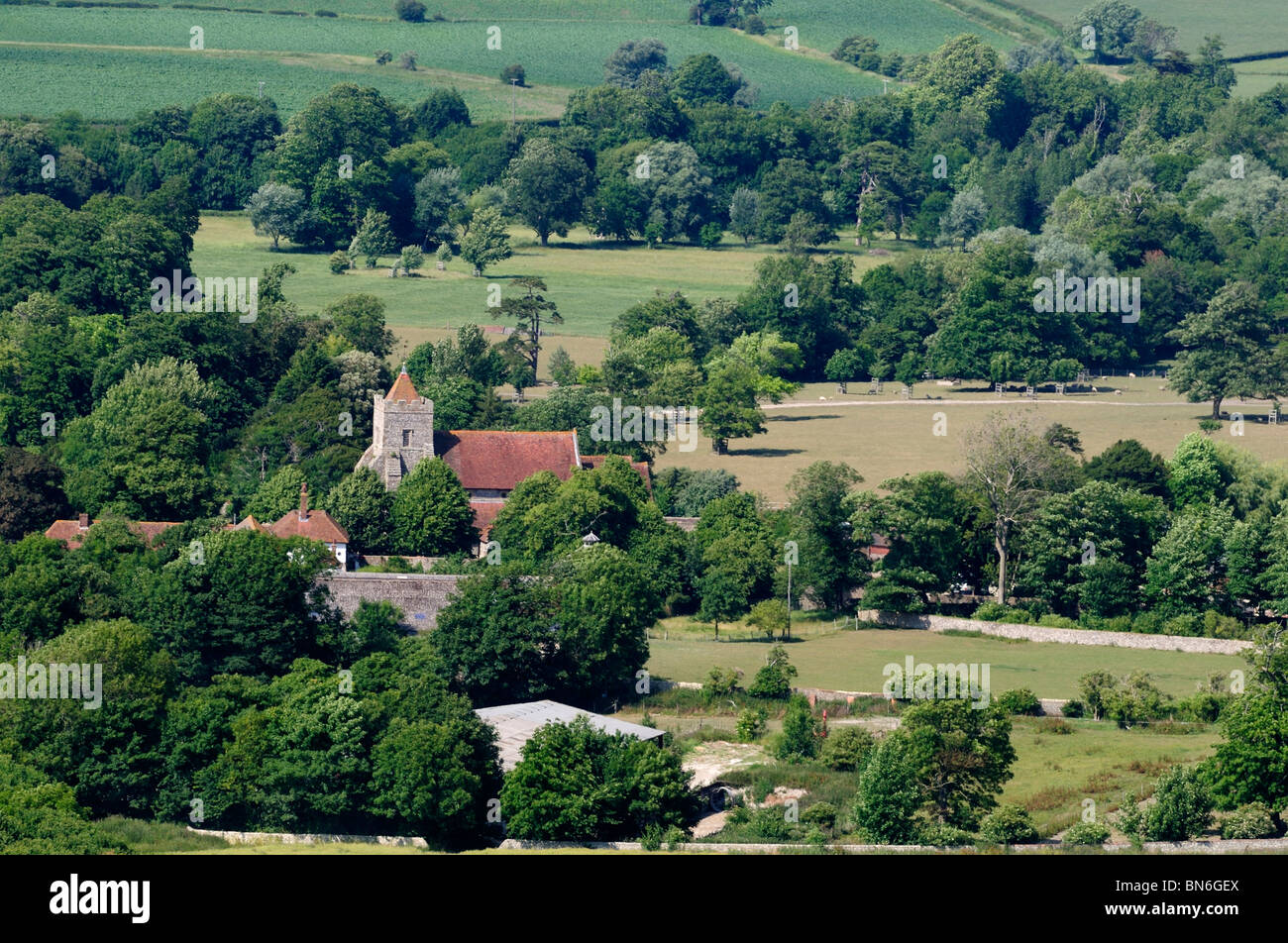 The view of St Peter's church in Firle from Firle Beacon in Sussex, England. Stock Photo