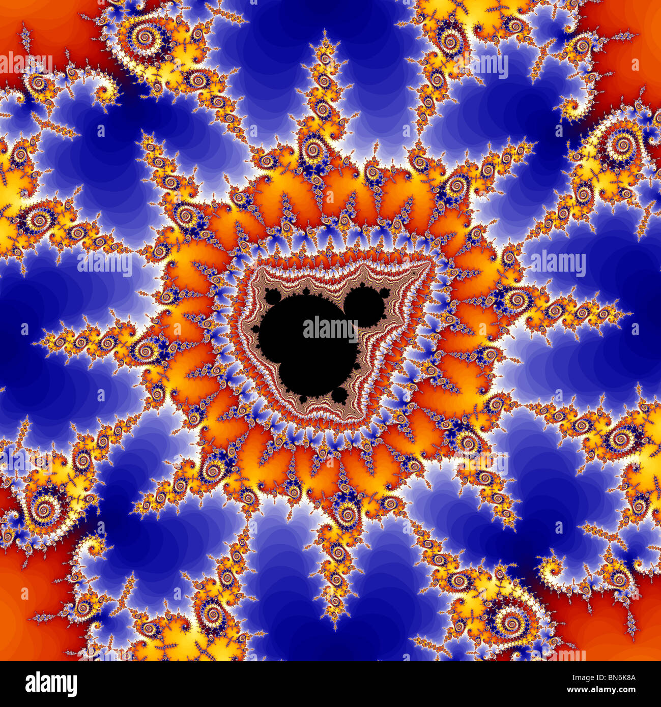 The Mandelbrot Set contains an infinite number of smaller copies of itself, surrounded by complex patterns. Stock Photo
