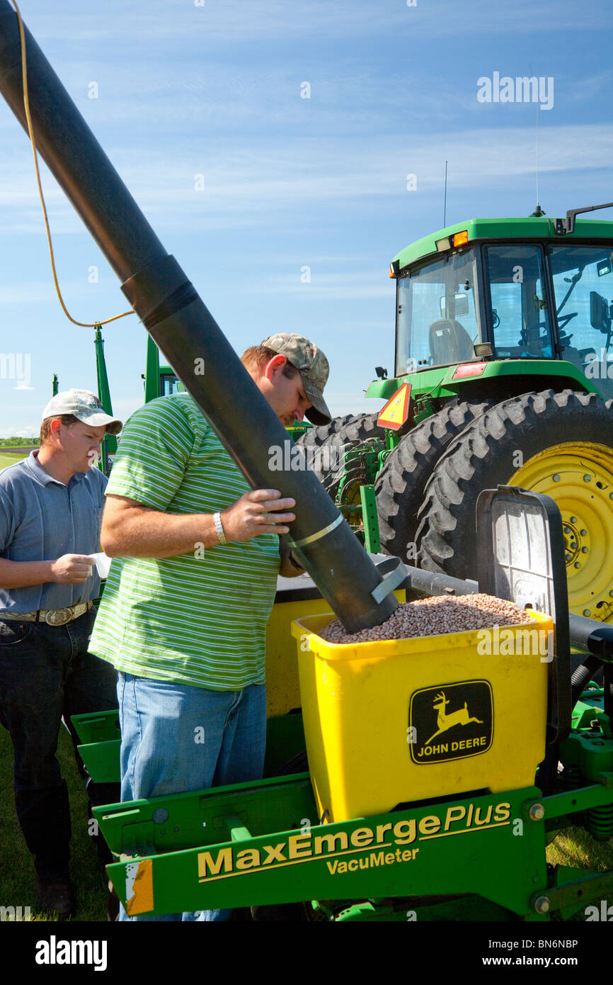 Loading a bean planter at the Froese farm near Winkler, Manitoba. Stock Photo