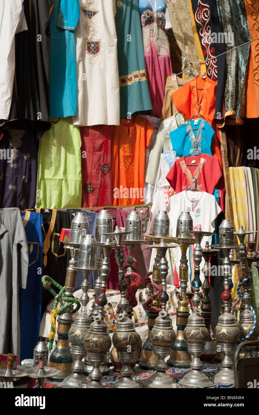Egypt market stall; Clothing and shisha pipes for sale  from Aswan market, Aswan, Upper Egypt Stock Photo