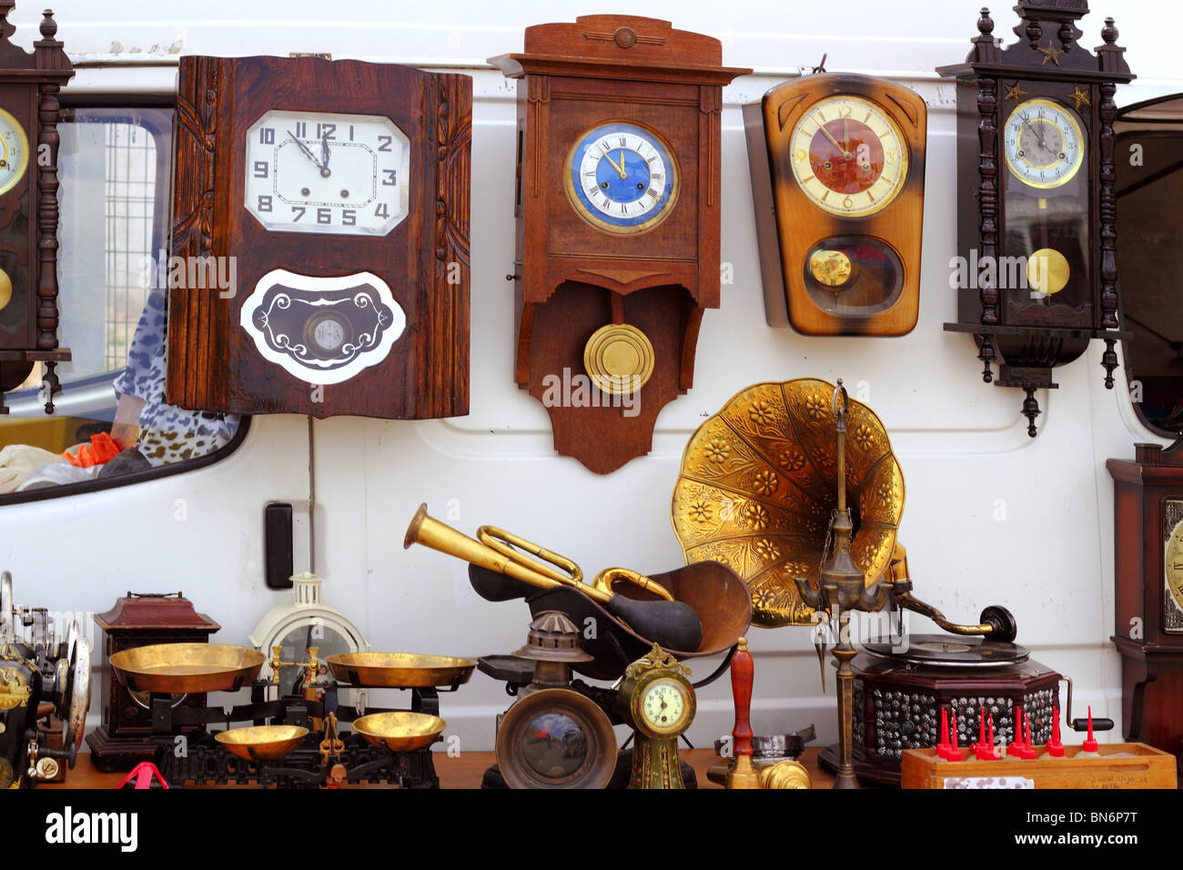 antiques fair market wall old clocks vintage stuff Stock Photo - Alamy