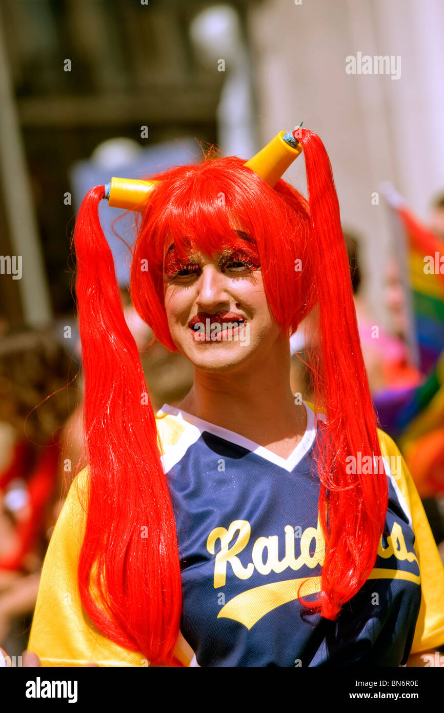 London Gay Pride Parade , young man , boy or lad , with long bright red hair  wig in bunches Stock Photo - Alamy