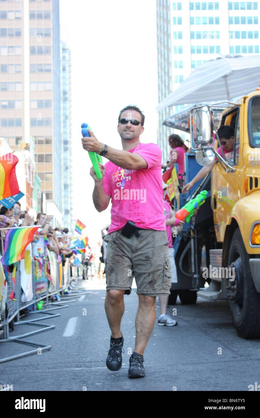 Man shooting watergun hires stock photography and images Alamy