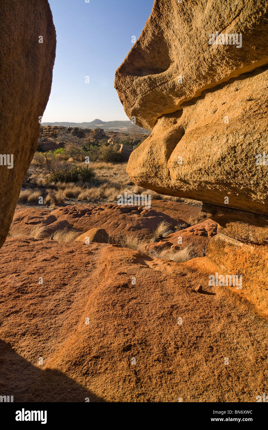 Sandstone formation in late afternoon light between rocks looking to ...