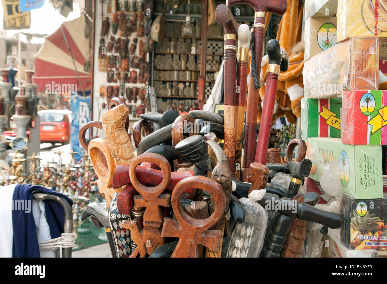 Egypt craft stall; Ankhs and Walking Sticks for sale in Aswan market, Aswan, Upper Egypt Africa Stock Photo