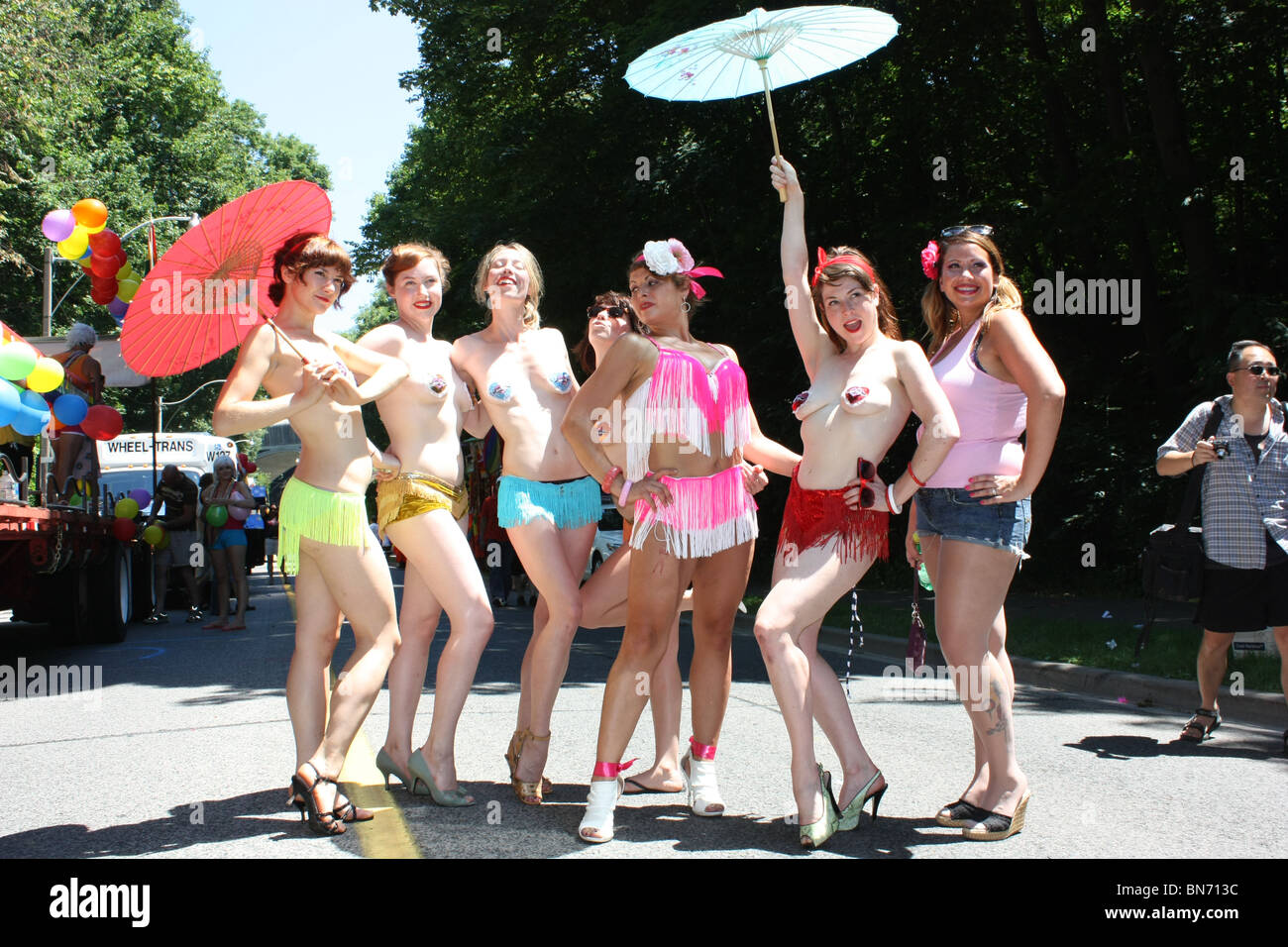 female burlesque performers pose outdoor Stock Photo