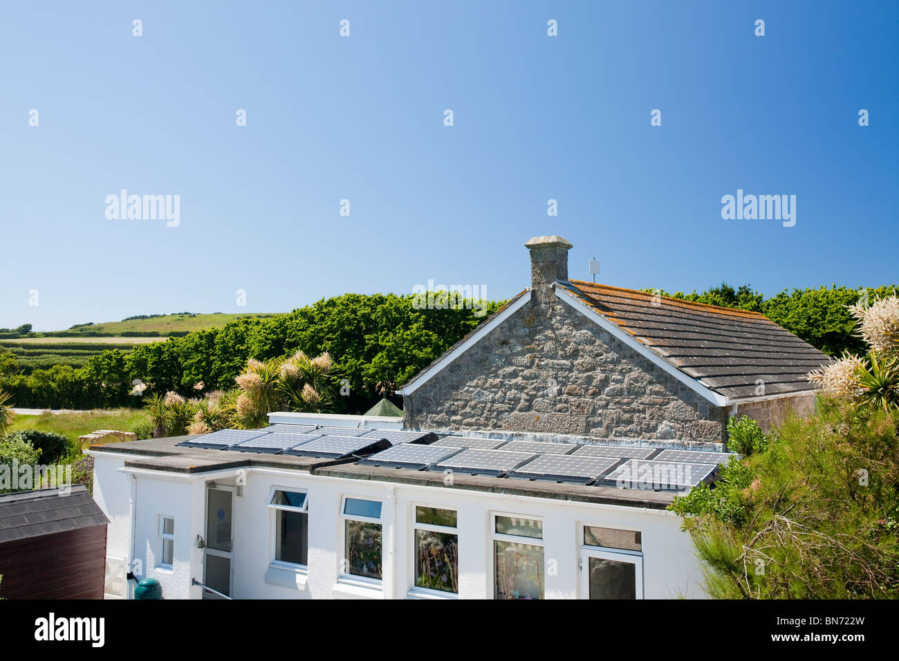 Solar electric panels on the roof of the Tresco and Bryher primary school, Isles of Scilly. Stock Photo