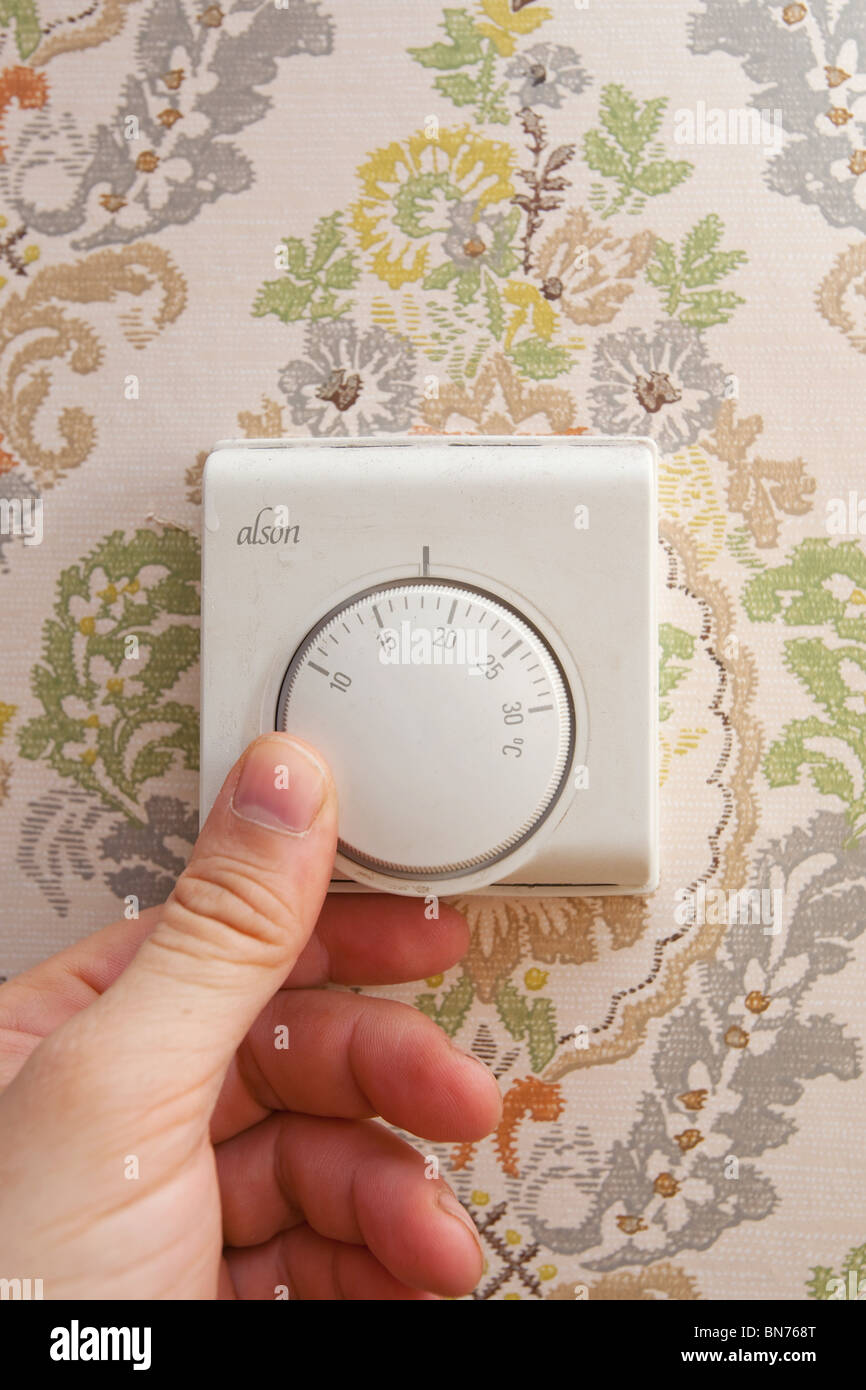 setting the temperature on central heating Stock Photo Alamy