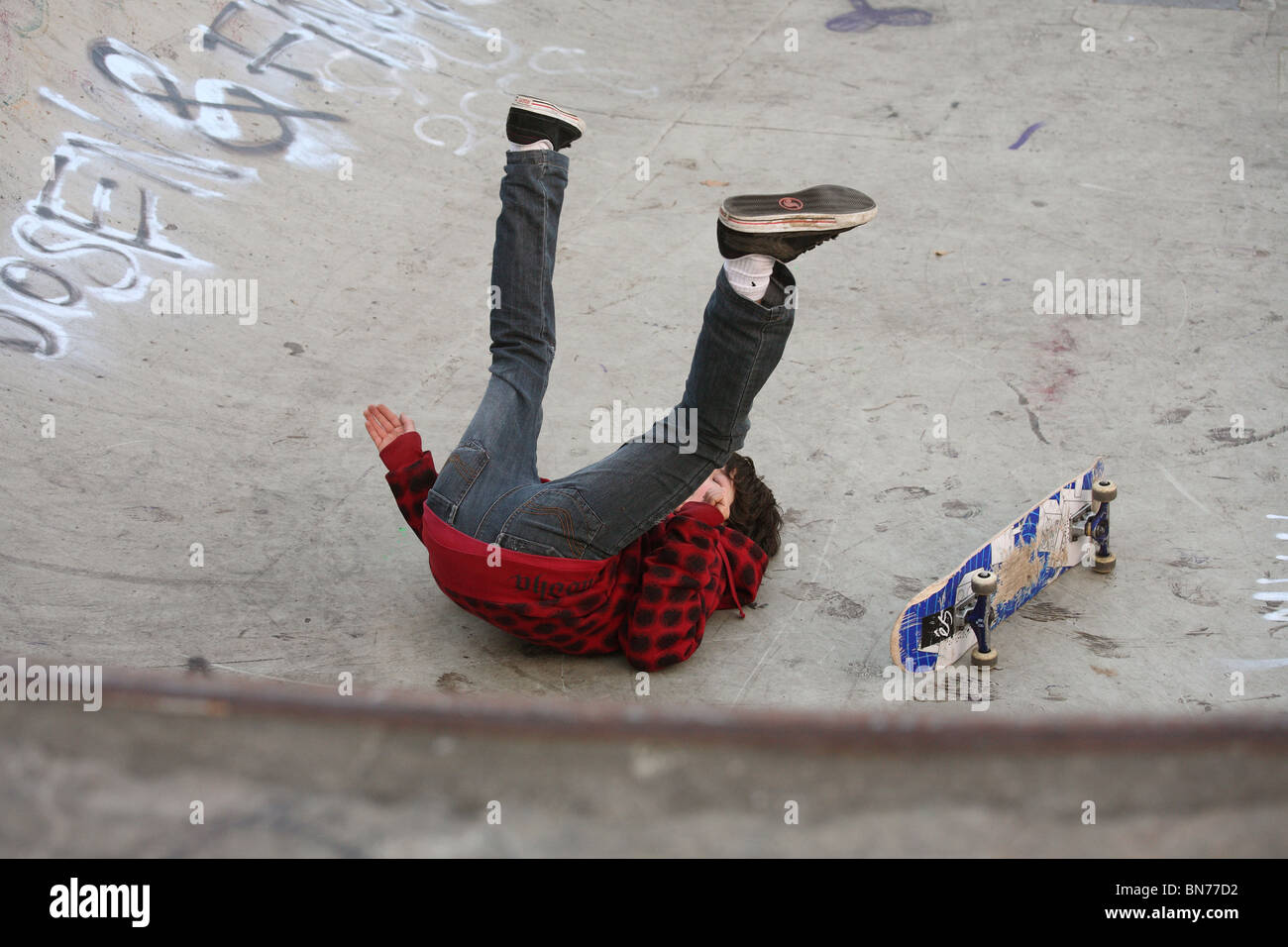 Young skateboarder in a halfpipe, Bremen, Germany Stock Photo