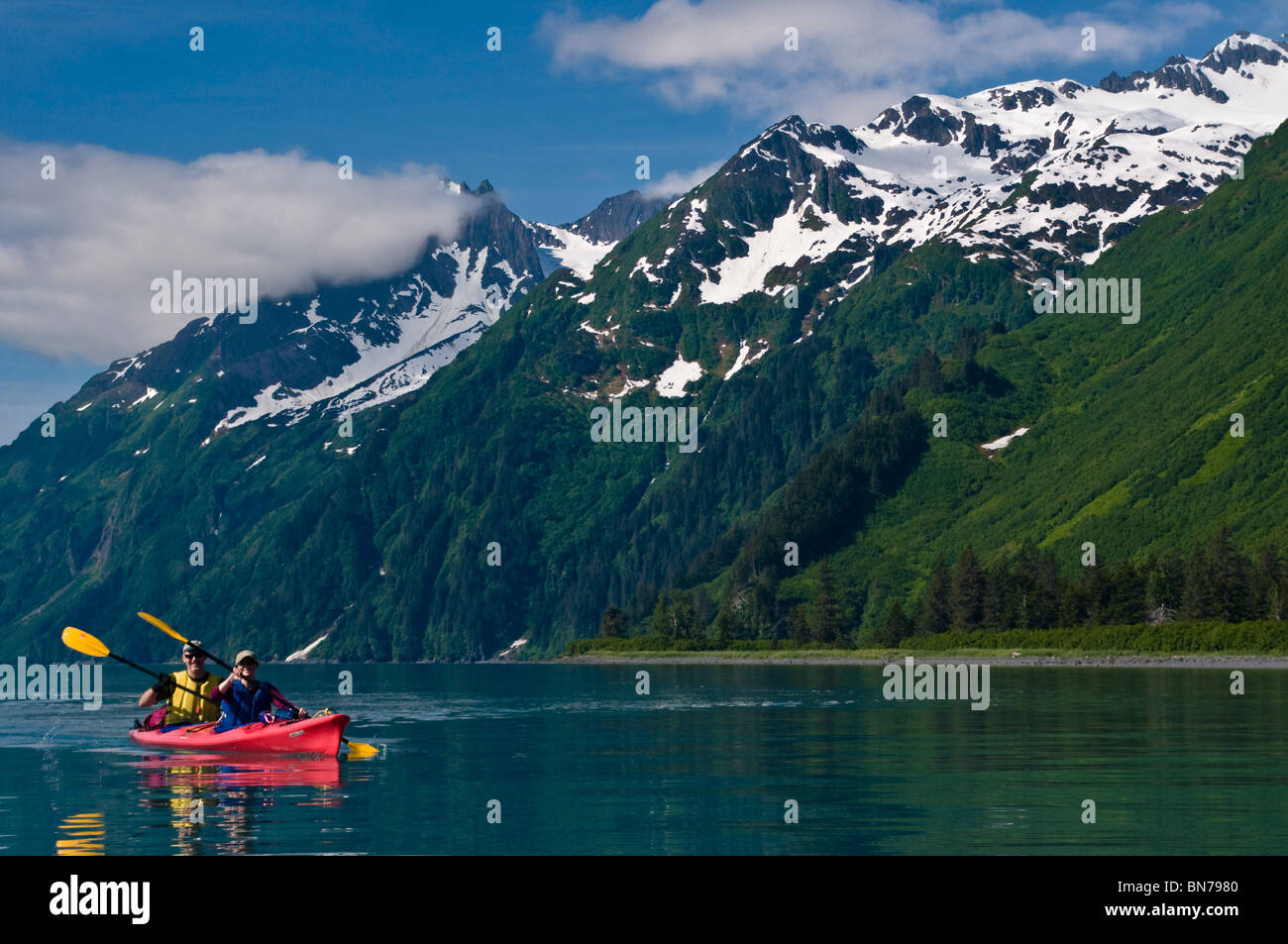 Couple kayaking in Shoup Bay, Prince WIlliam Sound, Alaska Stock Photo