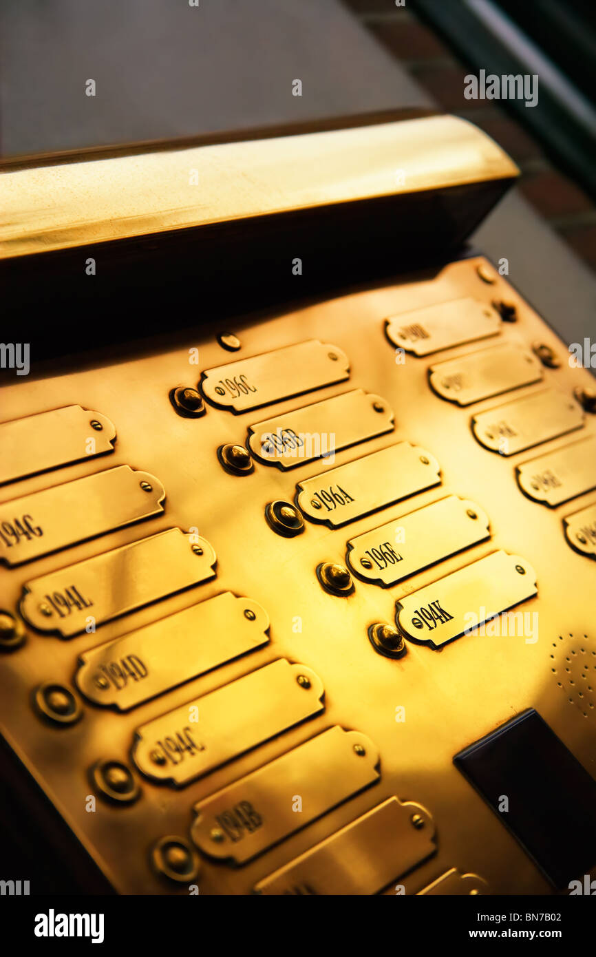 Golden doorbells with several blank nameplates stock photo alamy