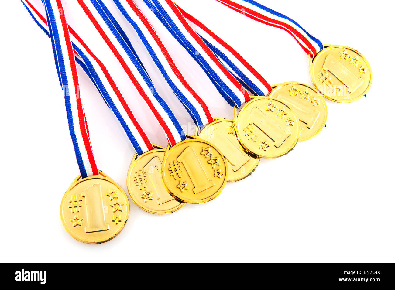 Golden medals with red white blue ribbon for the winner Stock Photo