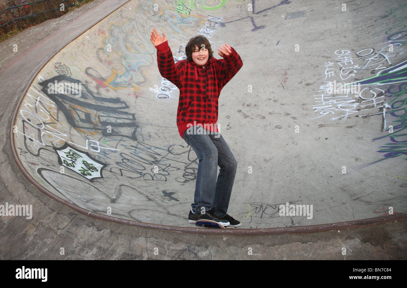 Young skateboarder in a halfpipe, Bremen, Germany Stock Photo