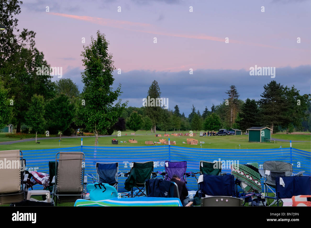 Twilight over the Tumwater Valley golf course in the staging and viewing area for the Thunder Valley Fireworks show extravaganza Stock Photo