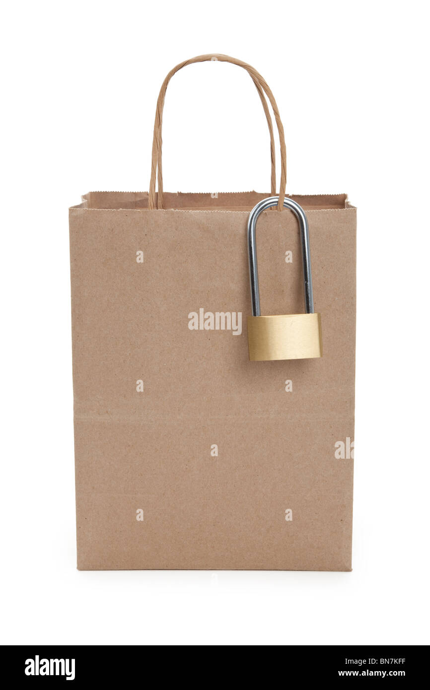 Brown paper shopping bag and lock, concept of tighten tudget Stock Photo