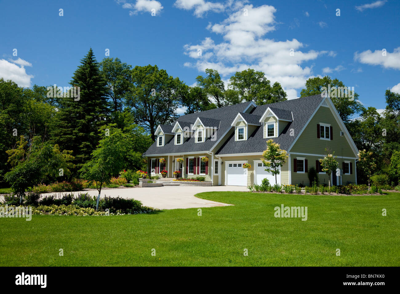 A country estate home and landscaped yard in Carmen, Manitoba, Canada