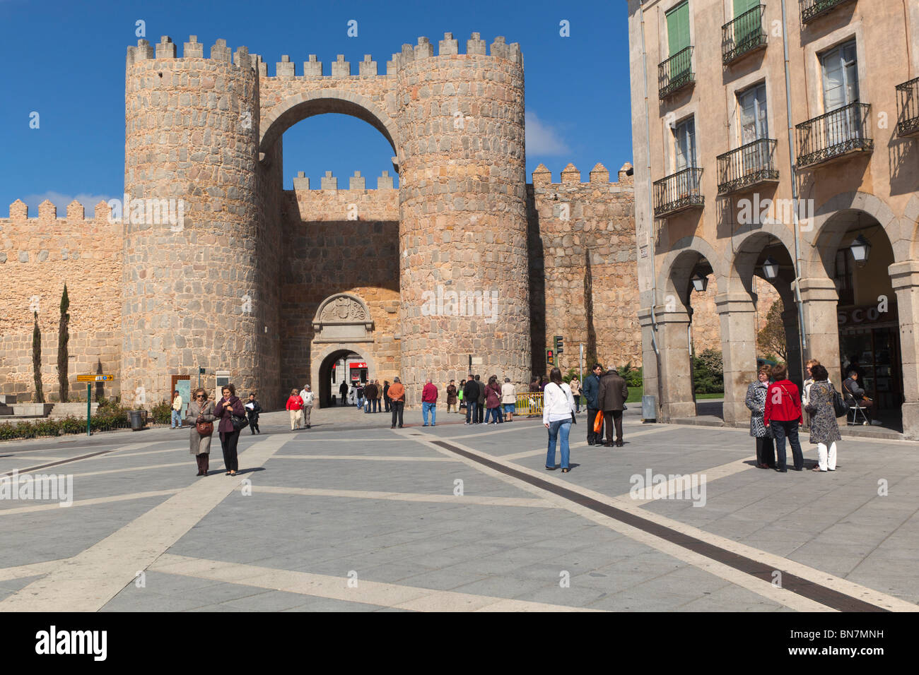 Avila, Avila Province, Spain. The Puerta del Alcazar and city walls seen from the Plaza de Santa