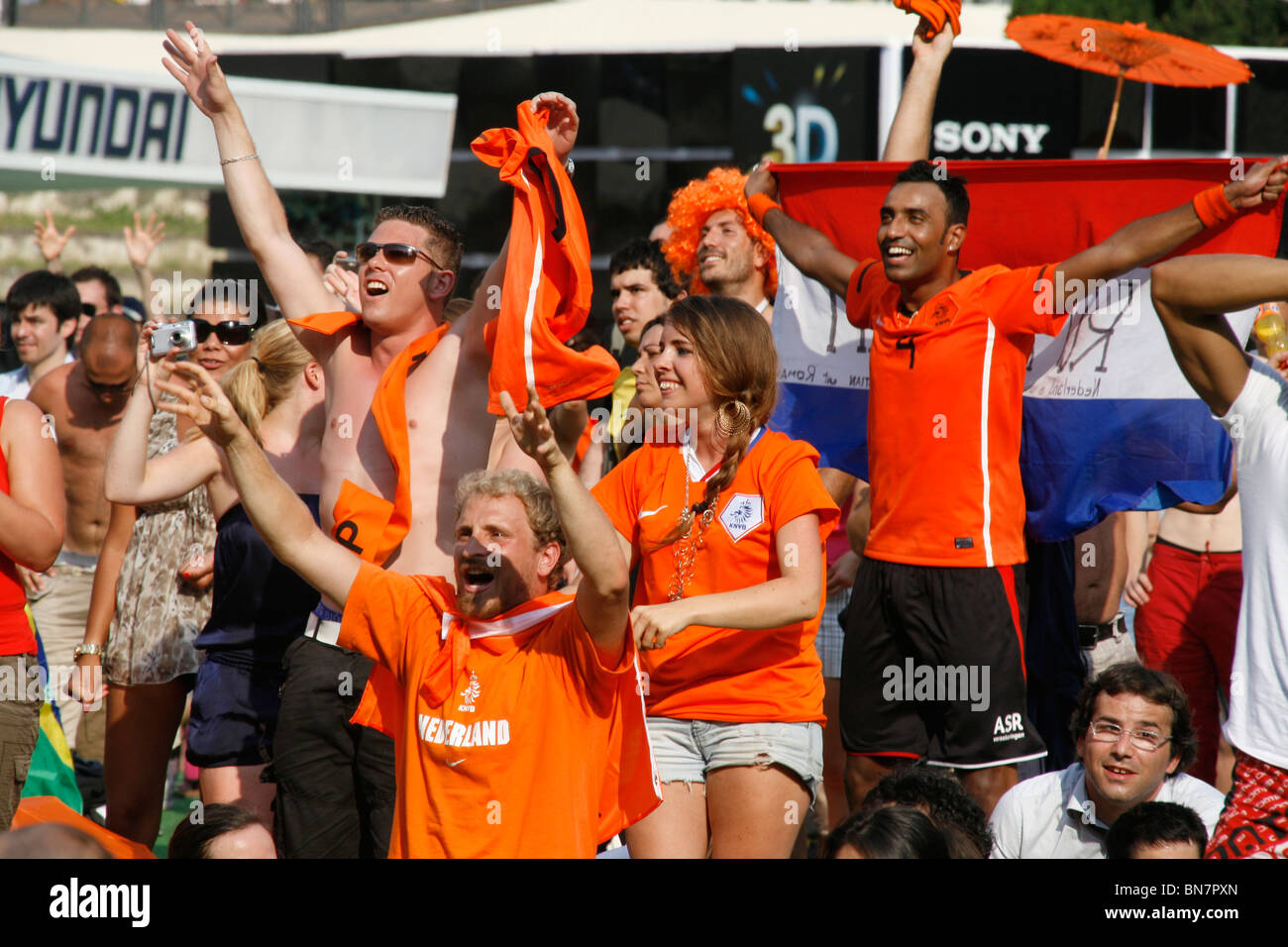 dutch supporters celebrating the victory over brazil at world cup fan fest village in rome, italy 2 July 2010 Stock Photo