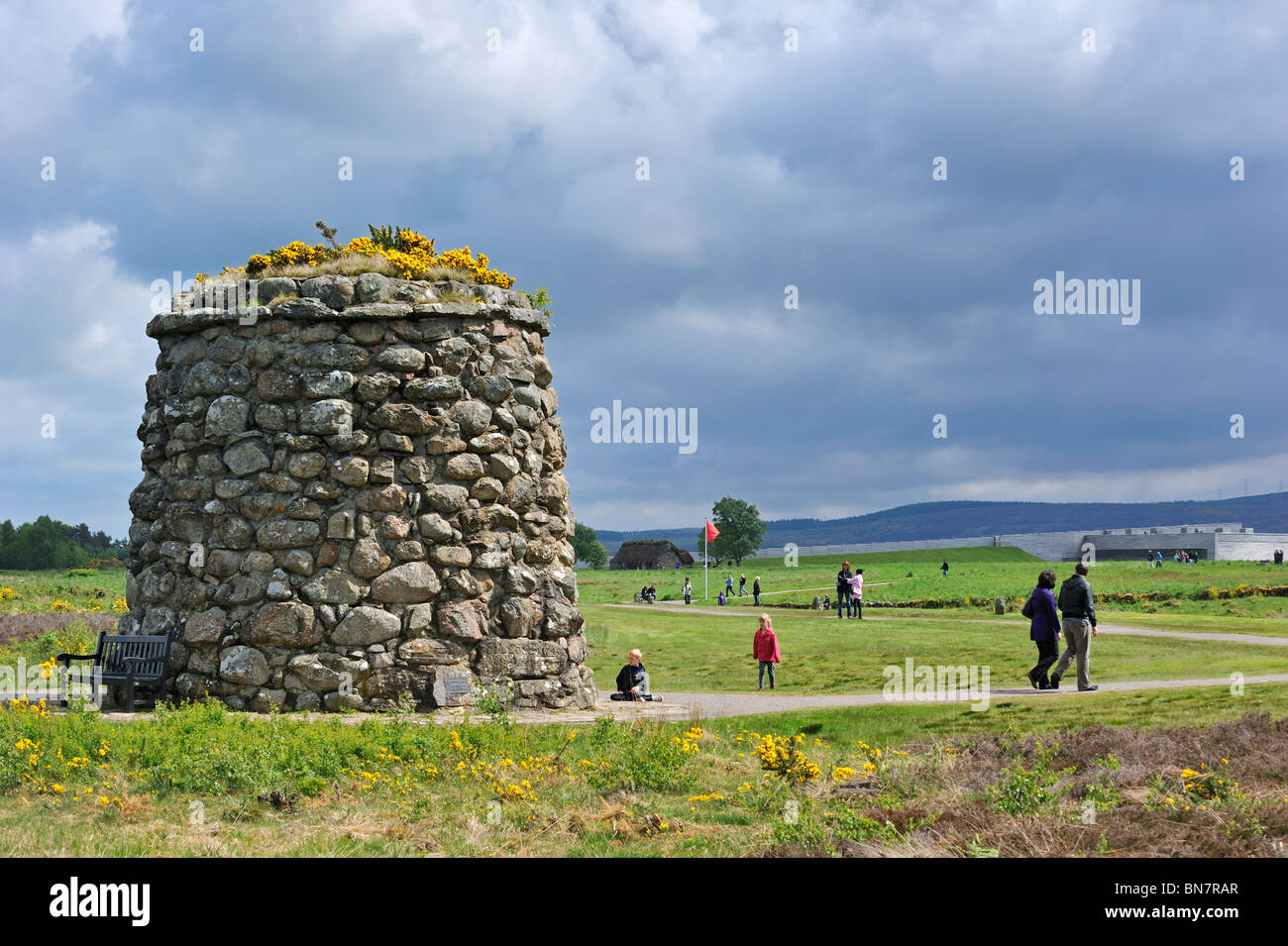 Tourists visiting the moor with its memorial cairn and visitor centre at the Culloden battlefield, Scotland, UK Stock Photo
