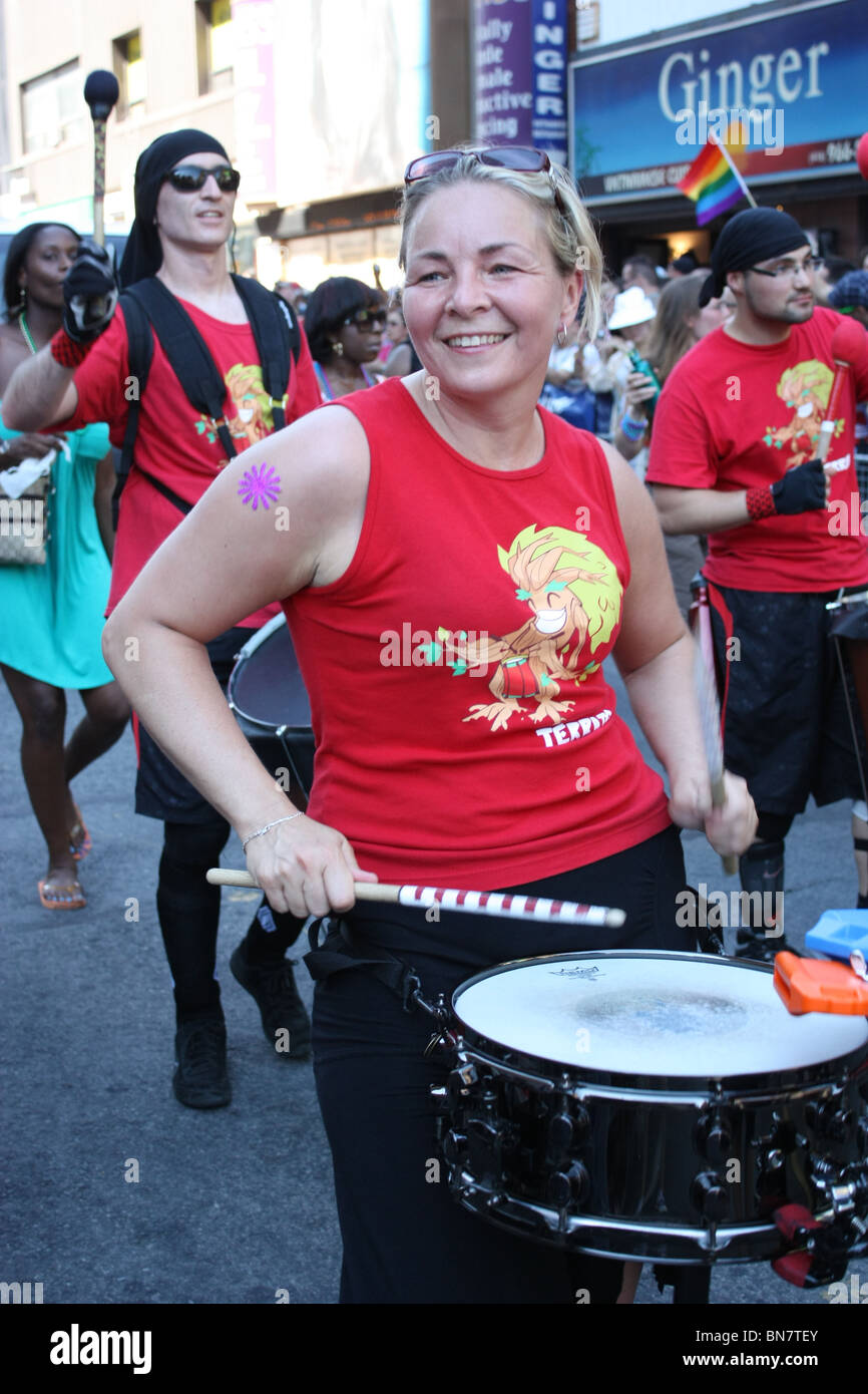 Female drummer street parade performance Stock Photo