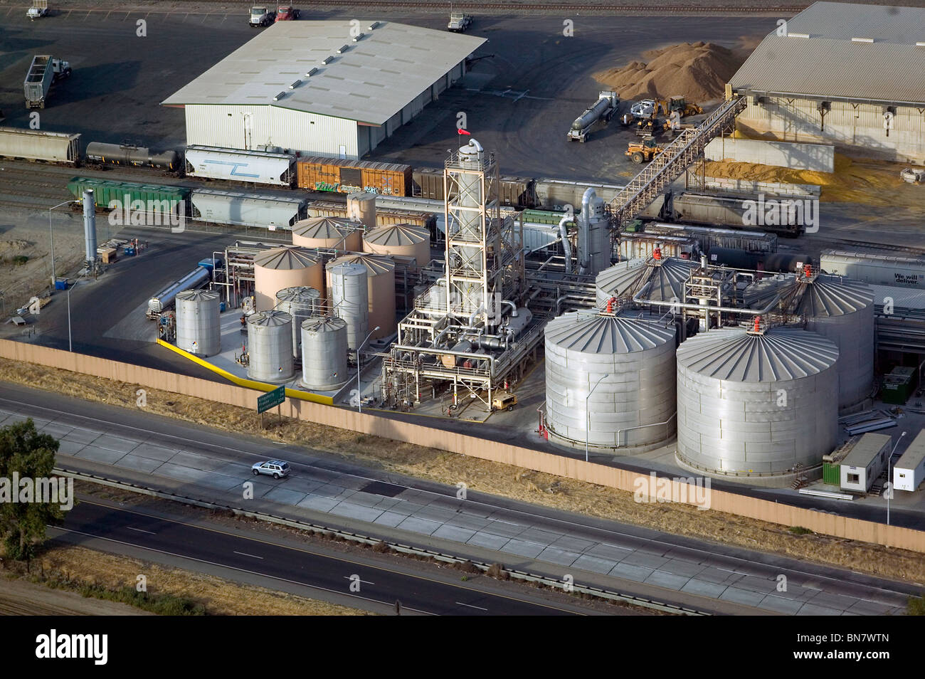 aerial view above grain elevator livestock feed processing central valley south of Fresno California Stock Photo