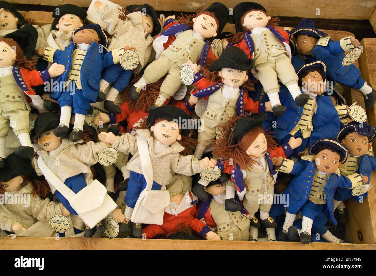 Cute cloth dolls of children in 18thcentury clothing are sold in
