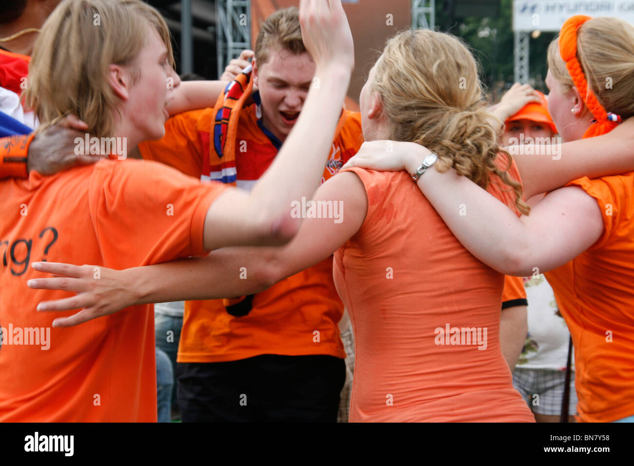 dutch supporters celebrating the victory over brazil at world cup fan fest village in rome, italy 2 July 2010 Stock Photo