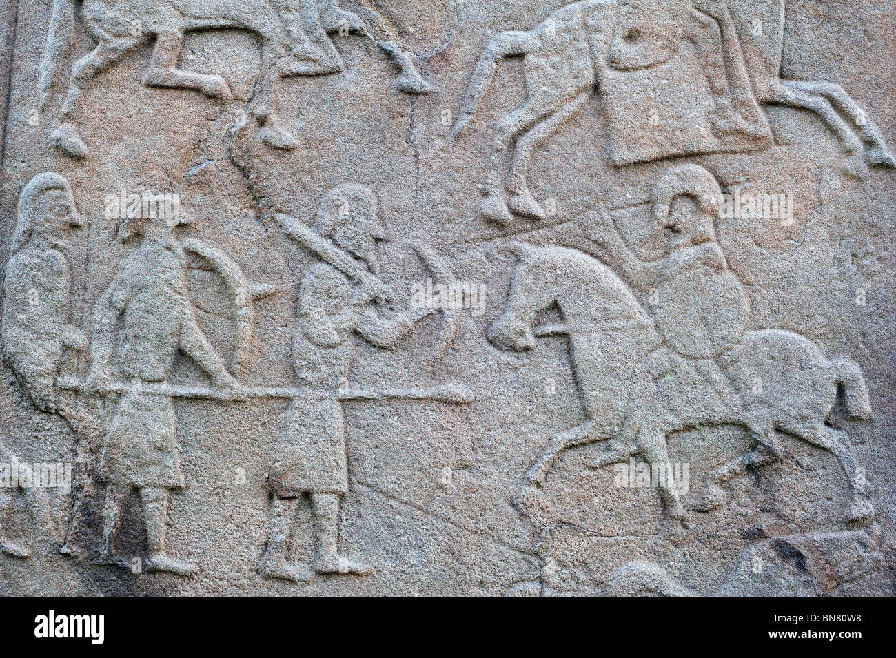 Detail of battle scene on the rear of the Aberlemno Kirkyard Cross Slab, a Pictish stone in Scotland Stock Photo