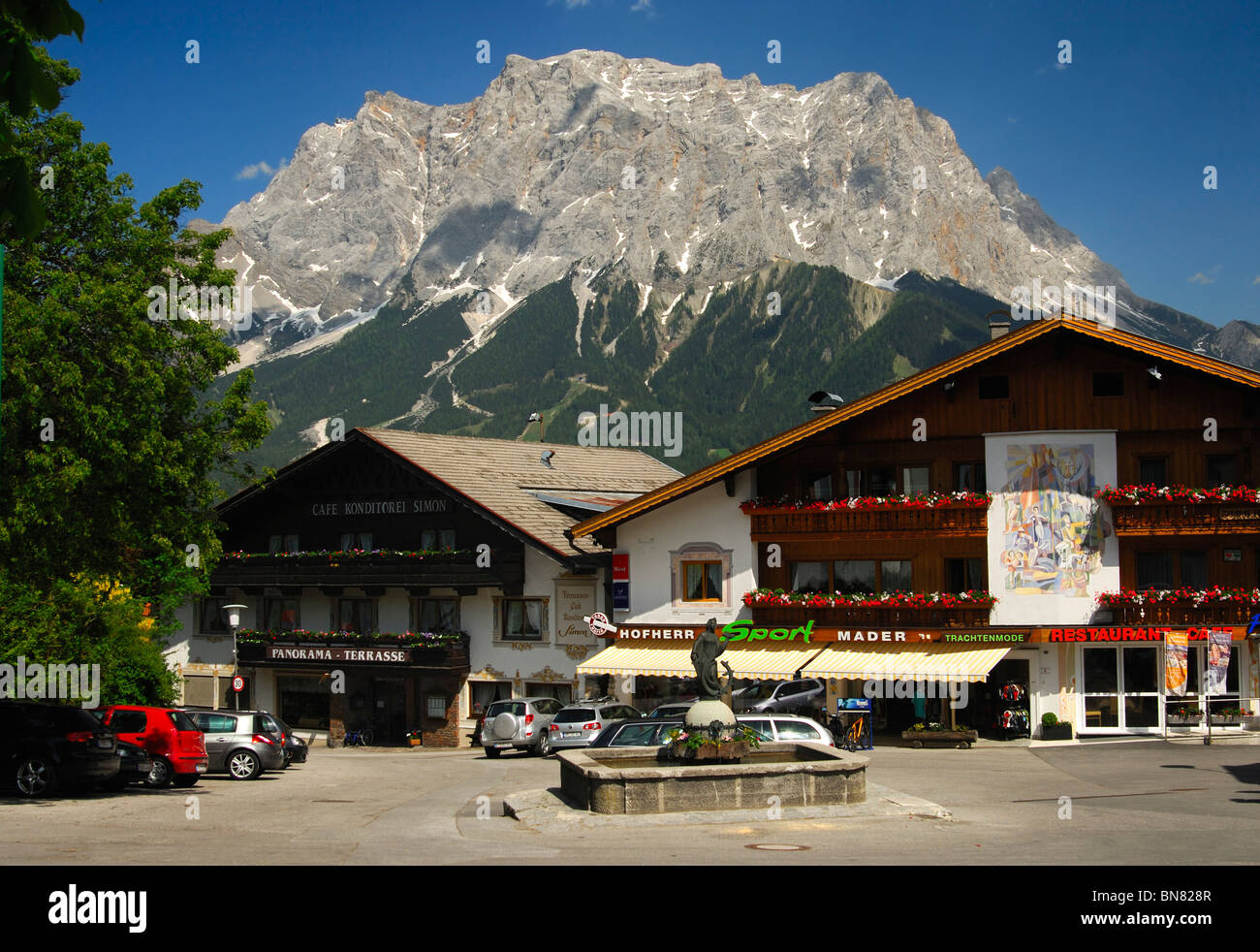 In the town centre of Lermoos, Wetterstein mountain range with Mt. Zugspitze in the back, Zugspitz Arena, Tyrol, Austria Stock Photo
