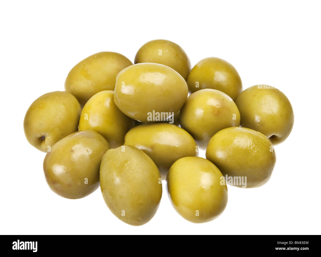 Green olive vegetable closeup on white Stock Photo - Alamy