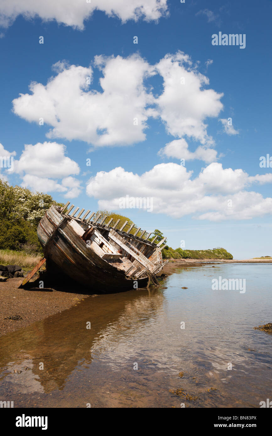 Old wooden hull of a ship wreck in Afon Goch river estuary. Traeth Dulas, Isle of Anglesey, North Wales, UK, Britain Stock Photo