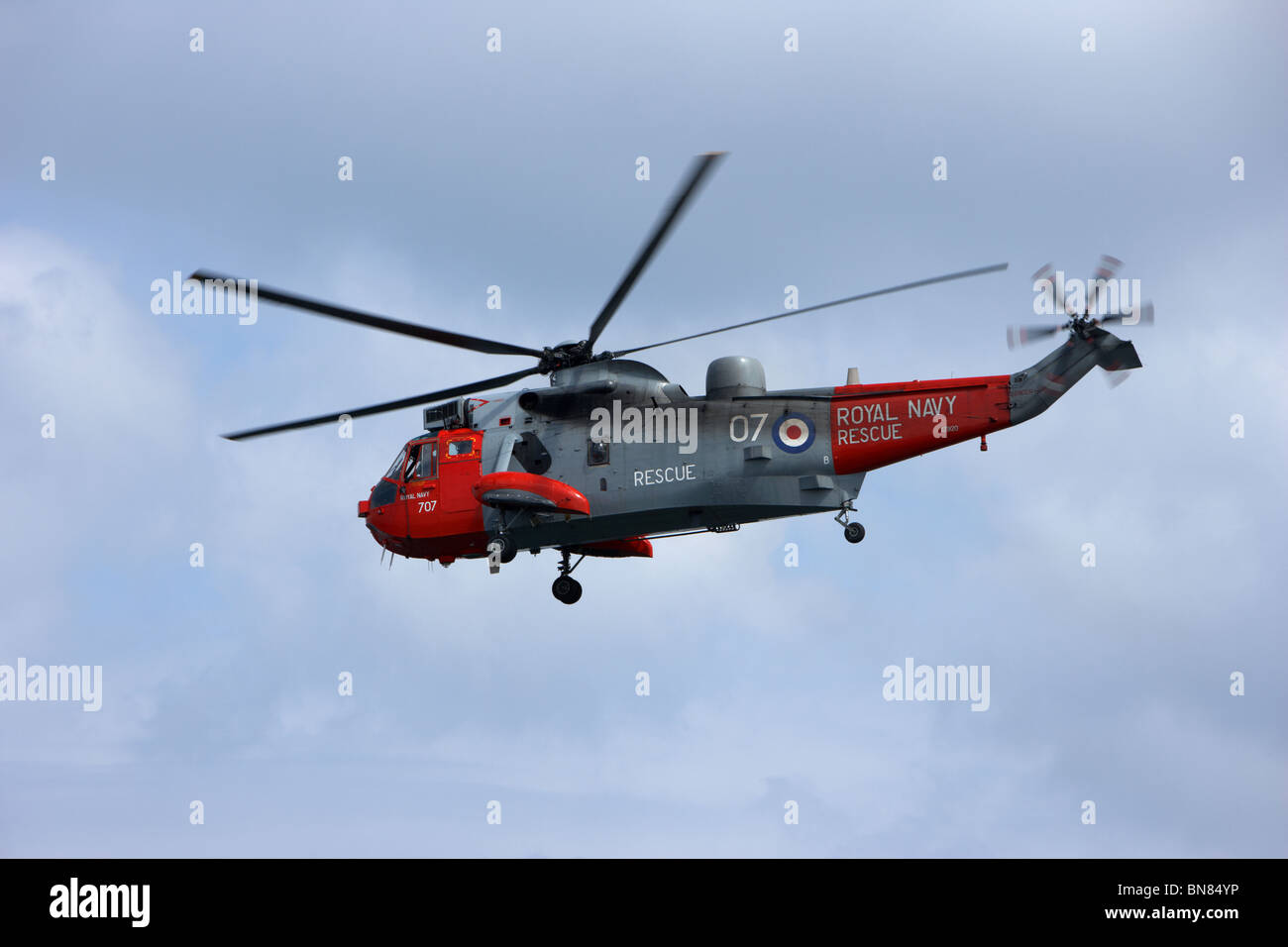 Royal Navy Rescue Westland Sea King HU5 helicopter XZ920 flying in the UK Stock Photo