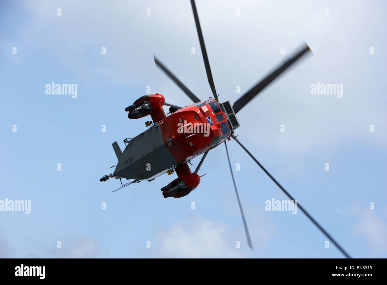 Royal Navy Rescue Westland Sea King HU5 helicopter XZ920 flying in the UK Stock Photo