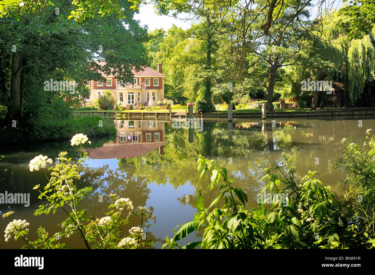 Residential housing by the River Wey at  Weybridge UK Stock Photo