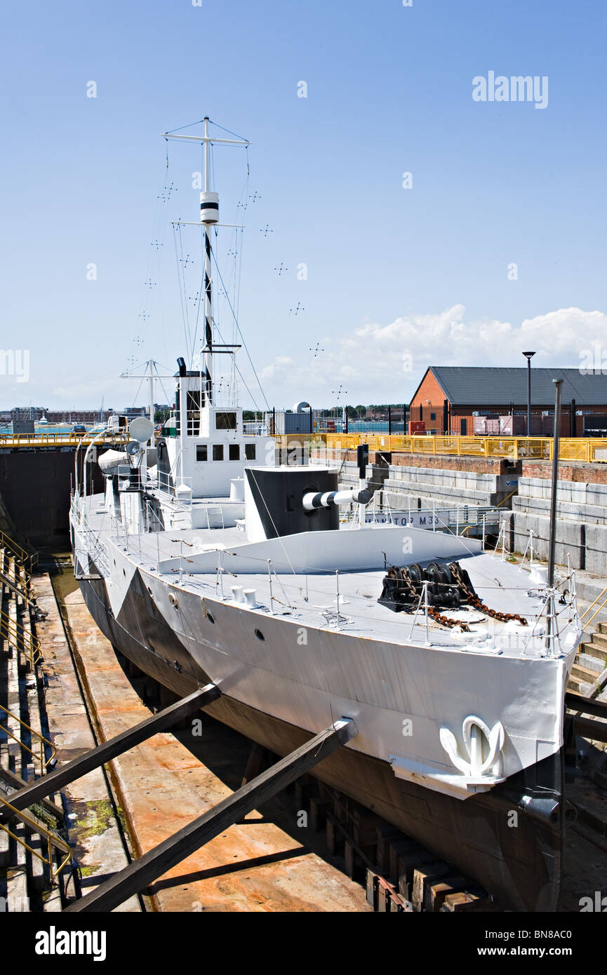Former British Royal Navy Warship Type M29 Monitor M33 in Dry Dock at Portsmouth Historic Dockyard England United Kingdom UK Stock Photo