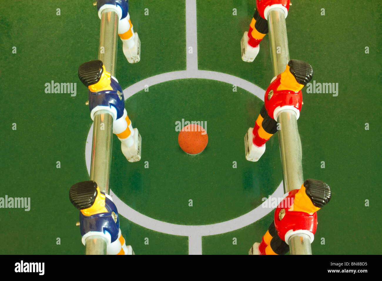 Table soccer or football field, players and ball Stock Photo Alamy