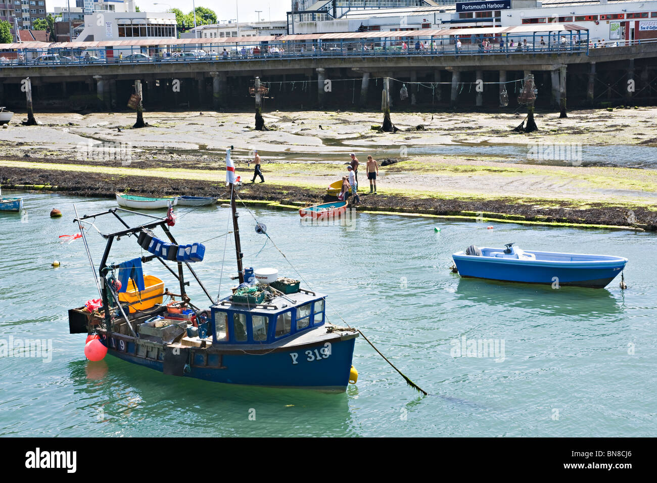 Fishing Boat Moored in Portsmouth Harbour near the Station with Smaller