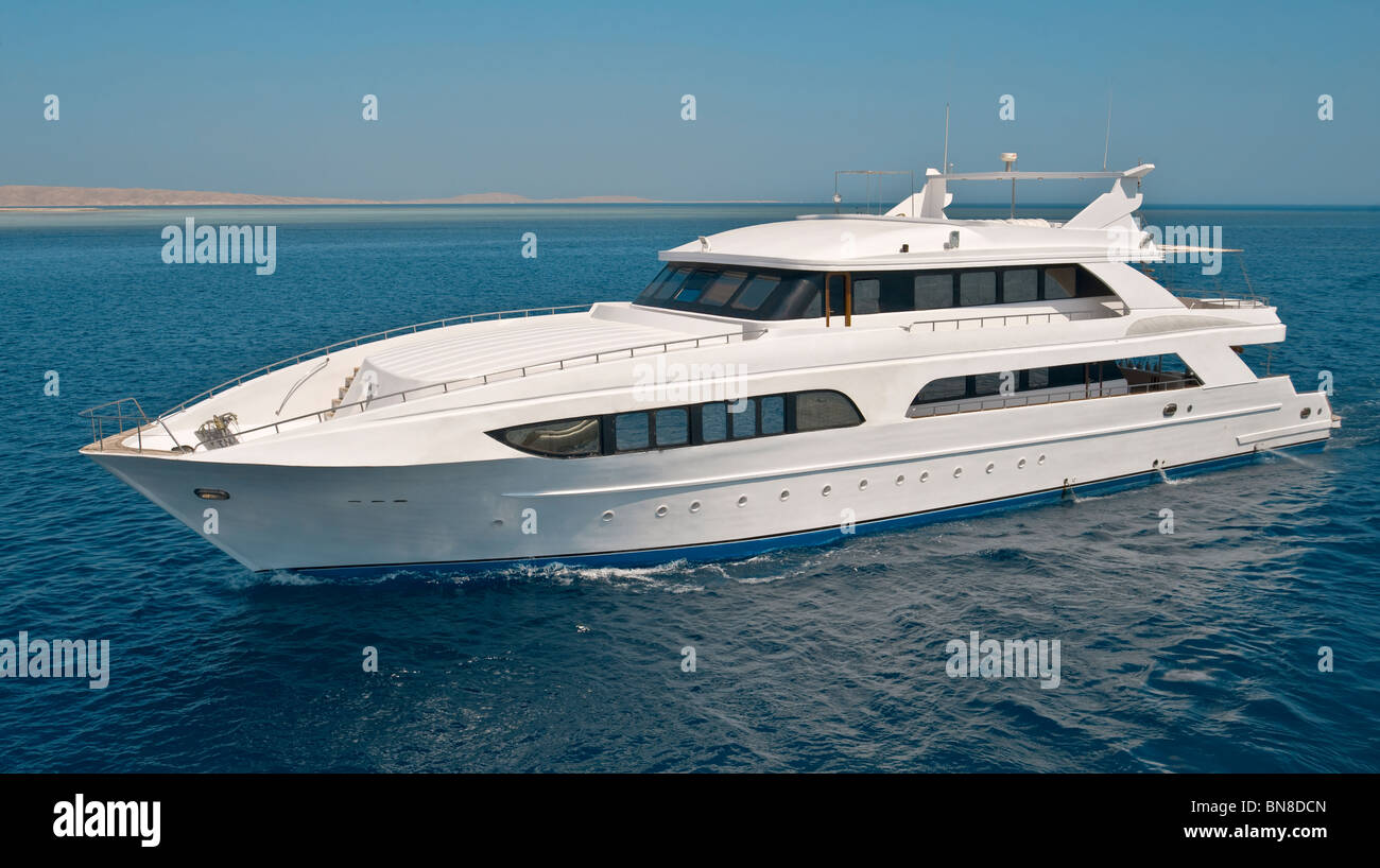 Large luxury motor yacht out at sea Stock Photo