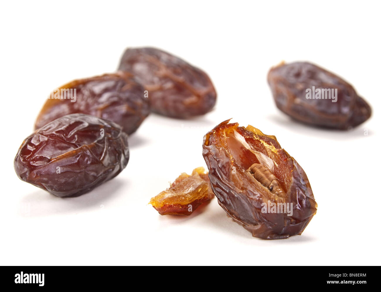 Dry date fruit group isolated on white background Stock Photo