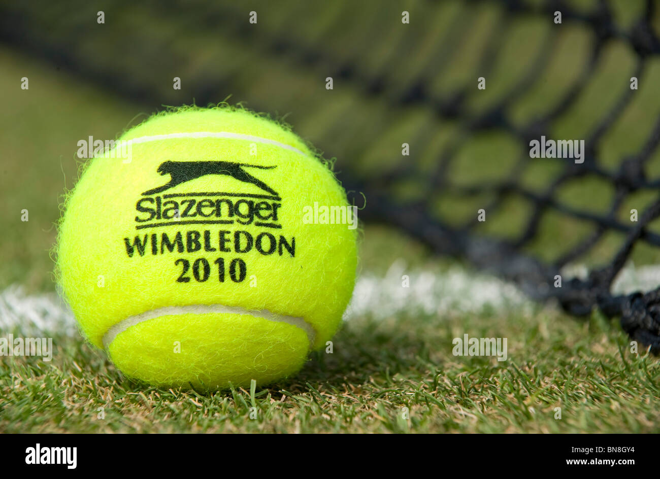 Wimbledon 2010 Slazenger tennis ball sits on a grass court during the Wimbledon Tennis