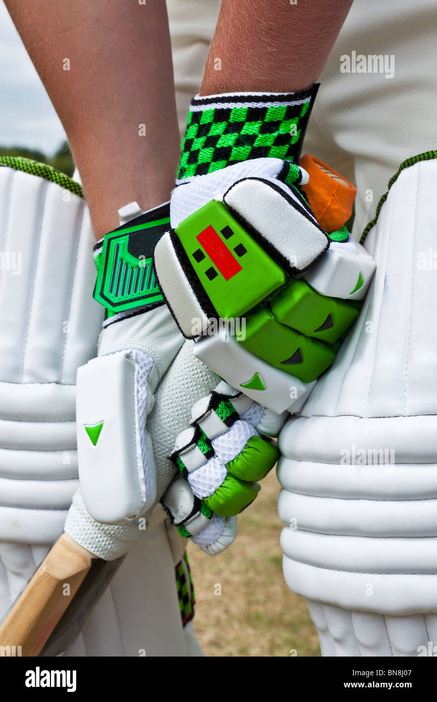 Cricket batsman stood at the crease holding the bat Stock Photo Alamy