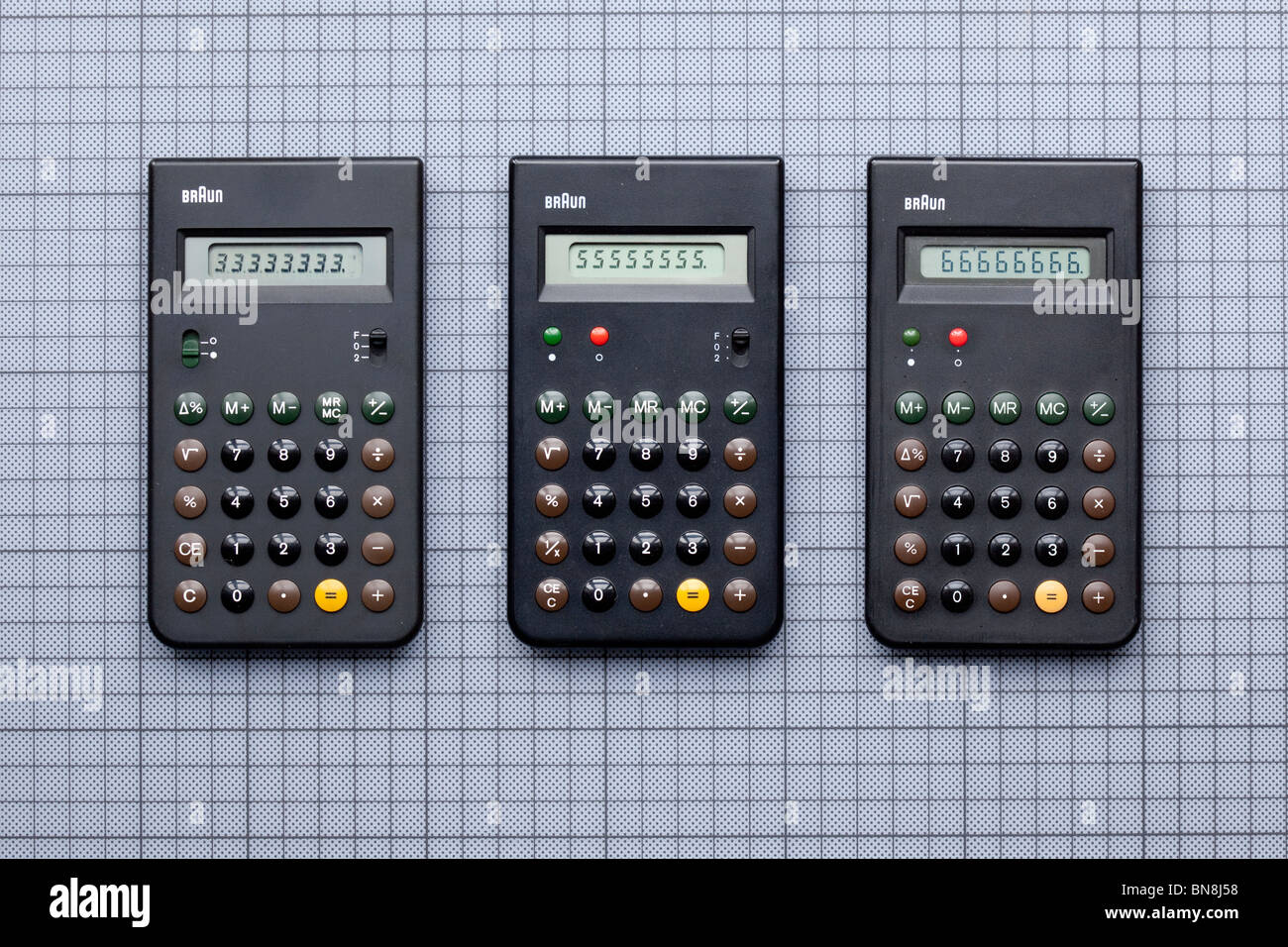 Three Braun calculators, ET33, ET55 and ET66, designed by Dieter Rams and Dietrich Lubs, 1977 - 1987 . and inspiration for the iPhone design Stock Photo