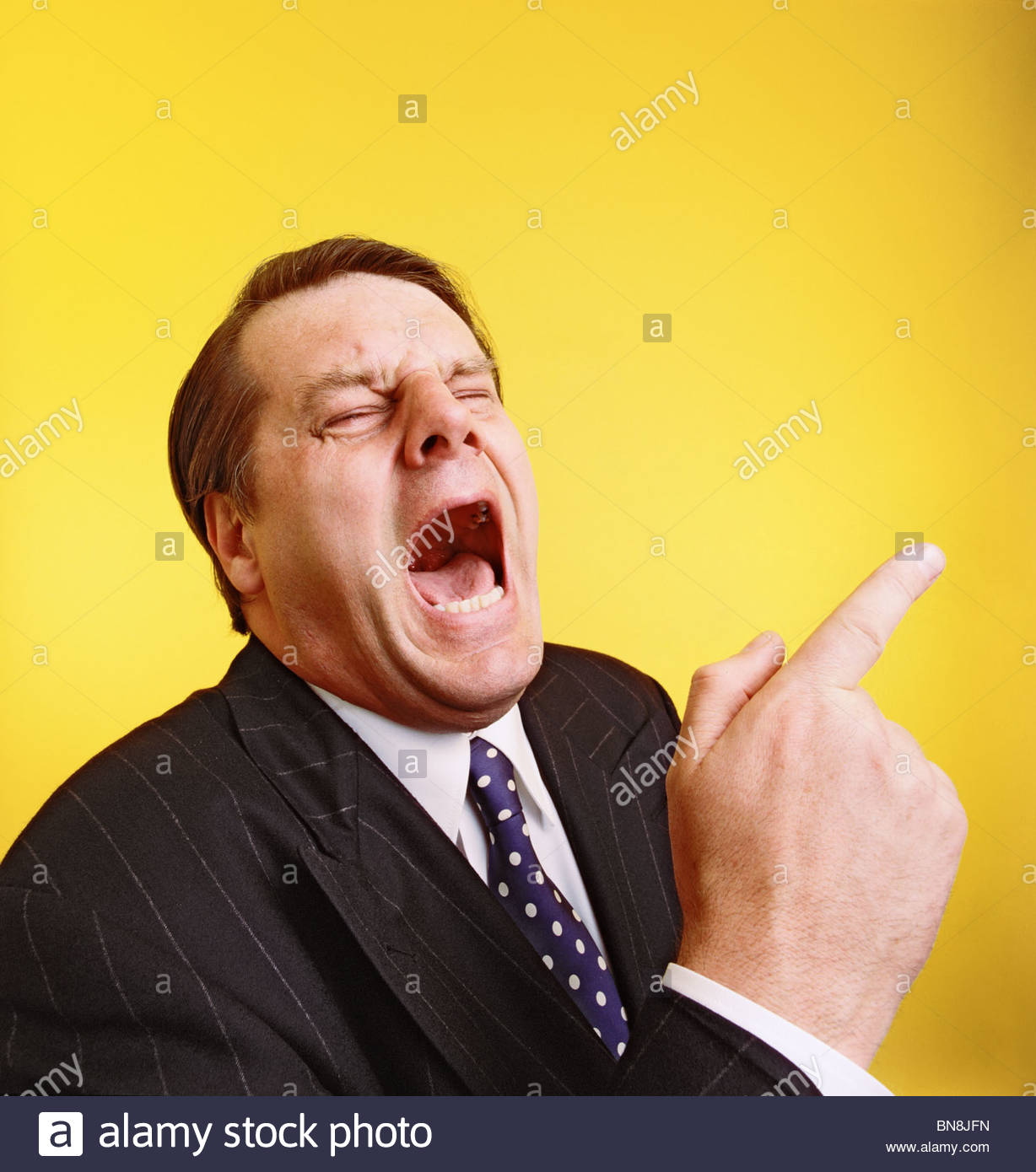 Man Laughing Out Loud And Pointing At Something Funny Stock Image Man Laughing Out Loud And Pointing At Something Funny Stock Image