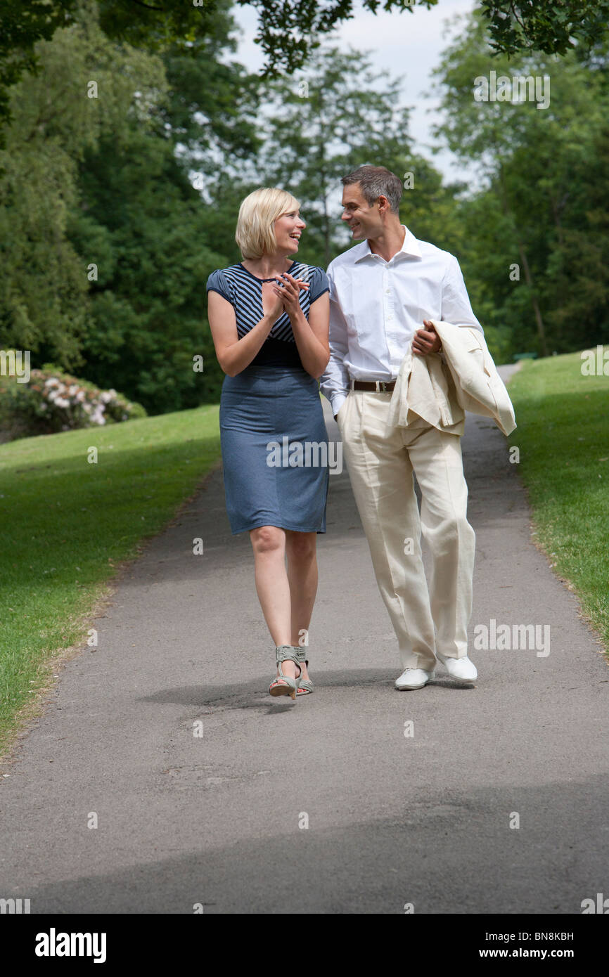 Woman walking in a park hi-res stock photography and images - Alamy