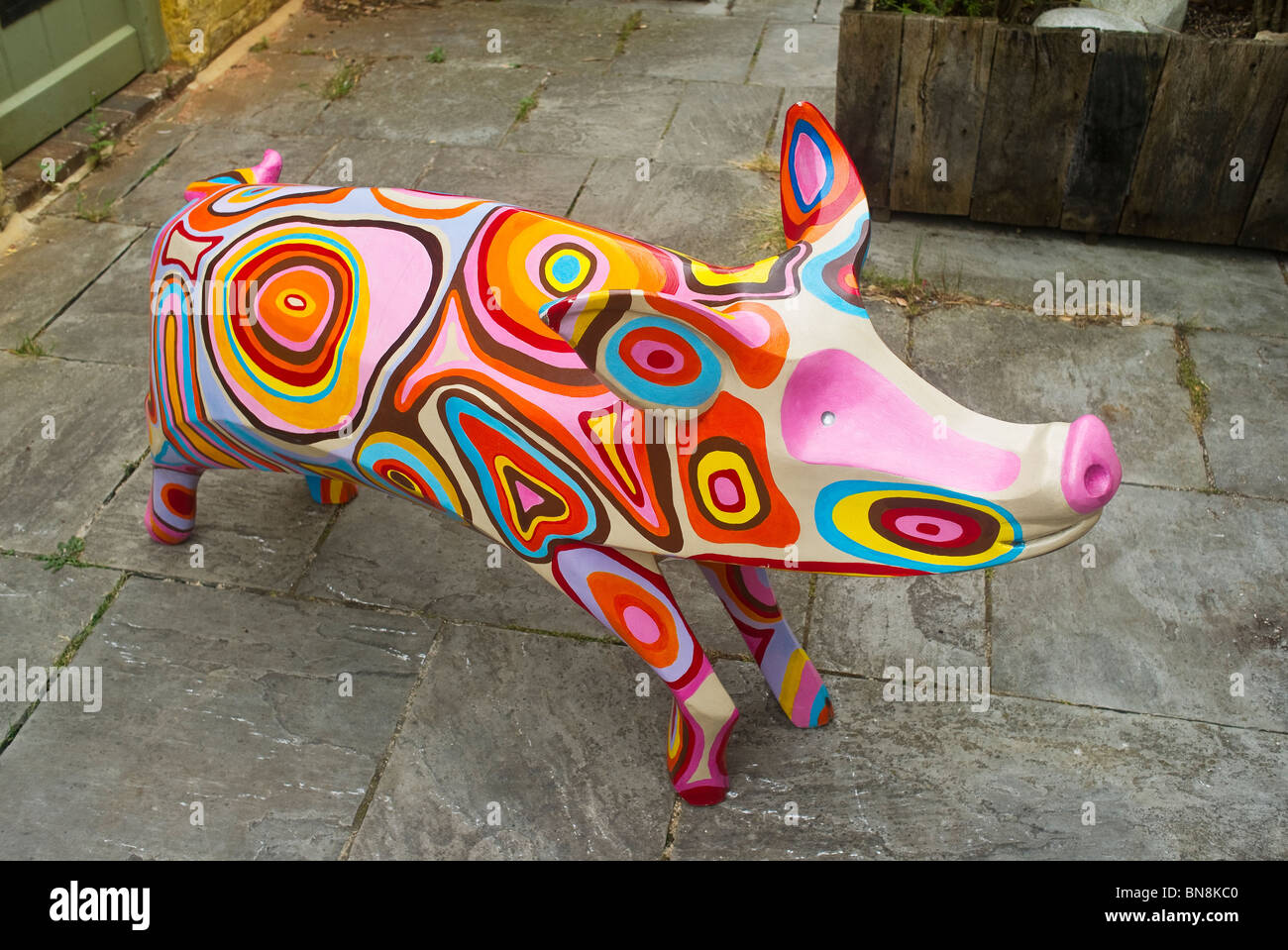 Painted pig in Cirencester Glos England UK EU Stock Photo